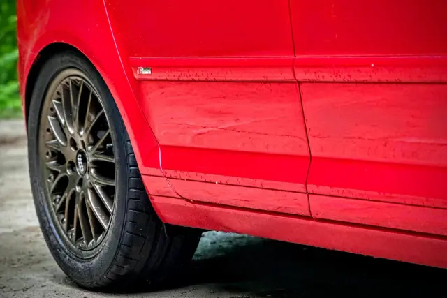Audi vehicle on lift during service
